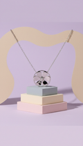 Collana acciaio con charm floreale