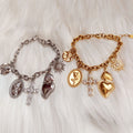 Bracciale a catena con charms sacri e portafortuna